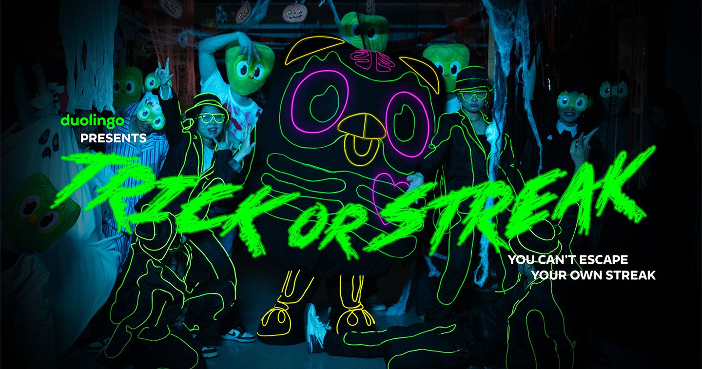 Duolingo's Trick or Streak key art with Duo drawn as a neon skeleton