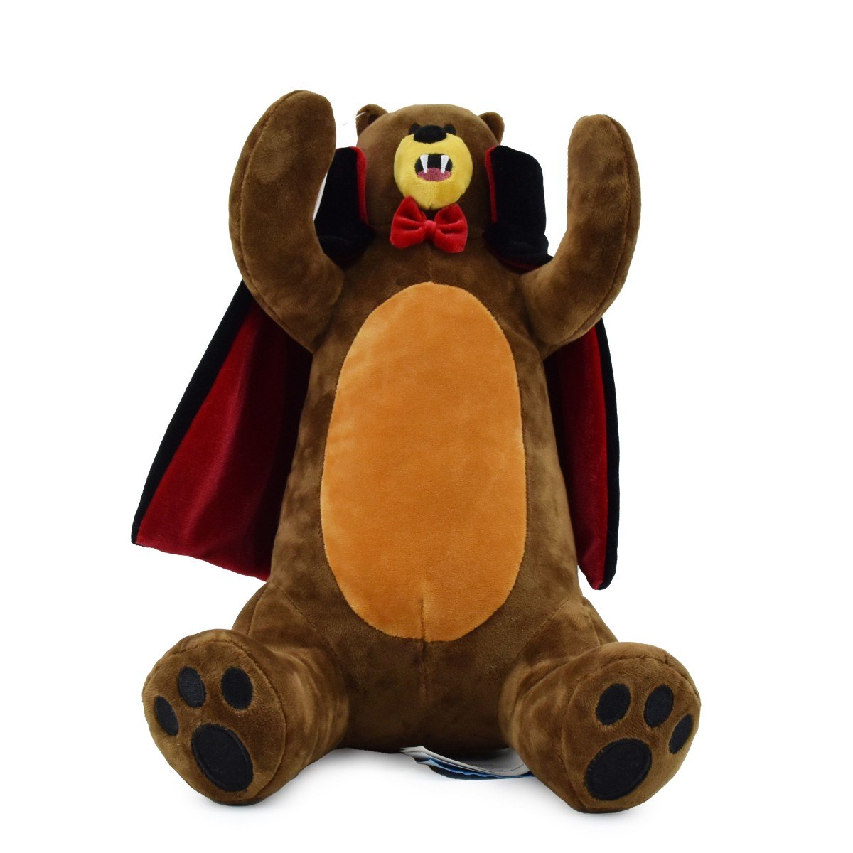 A brown bear plush with fangs, a bow tie and a red-lined cape